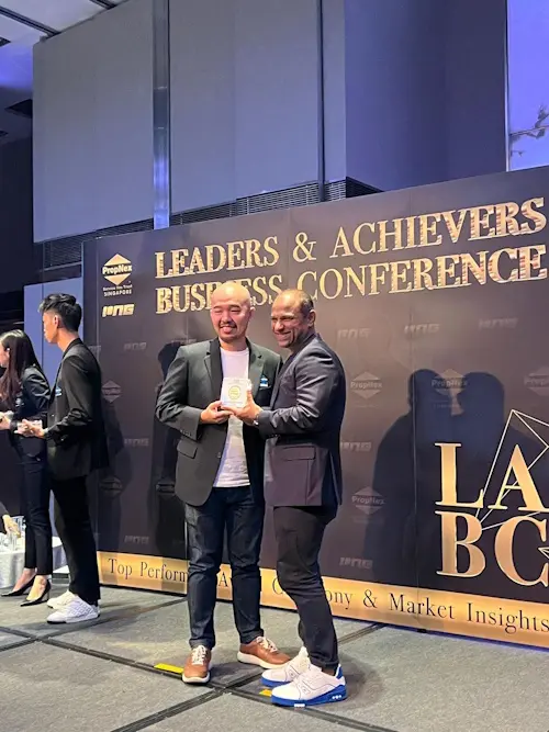 Jack Sheo receiving awards and recognition for excellence in Singapore real estate
